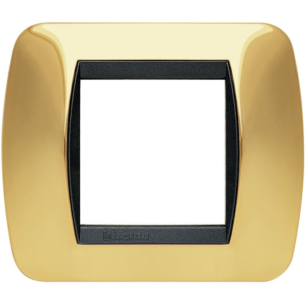 Bticino Living Int. Placca 2 posti oro L4802OR metal switch cover, elegant design, gold finish for modern interiors.