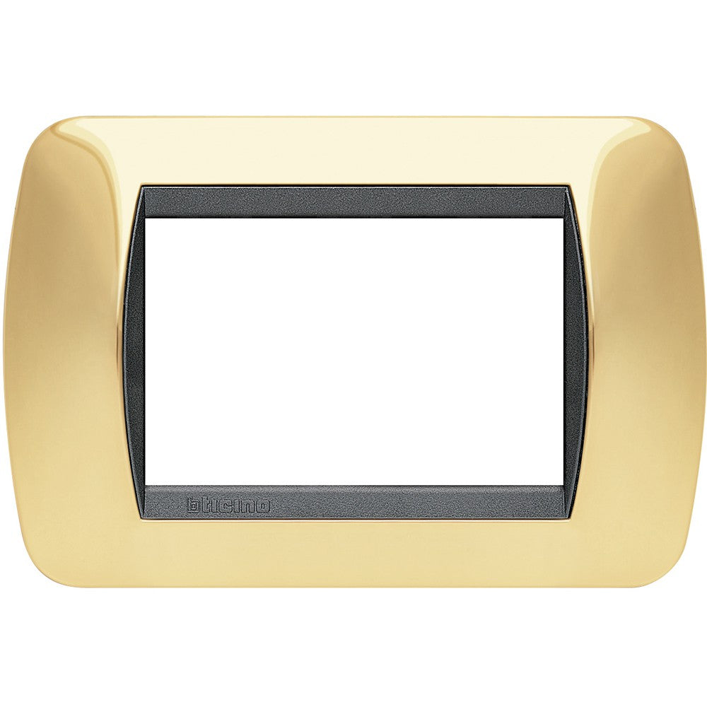 BTicino Livinglight gold metal 3-module switch plate, stylish design, dimensions 80x119mm.