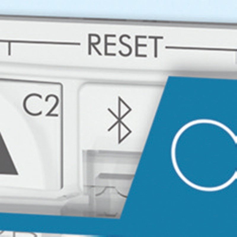 Close-up of ASTRO UNO time switch buttons, featuring RESET and Bluetooth symbol for easy configuration.