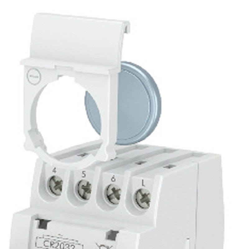 Close-up of ASTRO UNO digital astronomical timer switch with removable cover and terminal connections for easy installation.