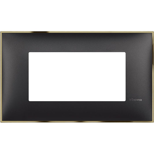 Bticino 4-module wall plate in gold and black, dimensions 86mm x 144.5mm, stylish and modern design.