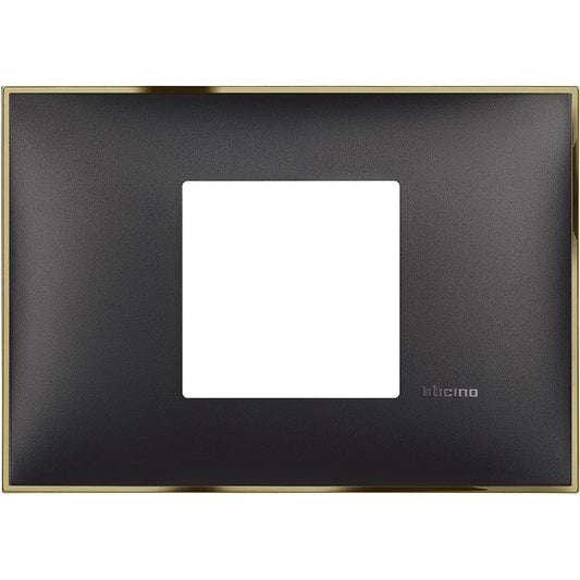 Bticino 2 module frame X 503 in gold and black, dimensions 86mm height, 122mm width, stylish design for modern interiors.