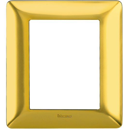 Placca Bticino Matix 3+3 moduli in oro satinato, dimensioni 132mm x 120mm, materiale tecnopolimero.
