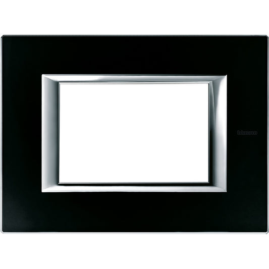 BTicino Axolute 3-module black glass cover plate, sleek rectangular design, dimensions 95mm x 127mm.