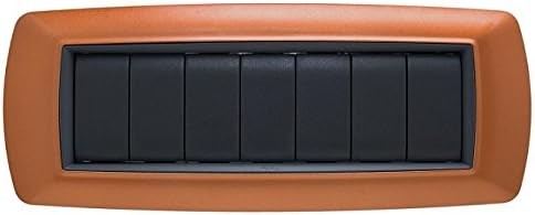 Placca Life 7P in Rame with six black switches, ideal for modern electrical installations and stylish decor.